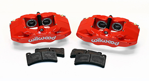 Wilwood DPC56 Rear Replacement Caliper Kit Parts Laid Out - Red Powder Coat Caliper