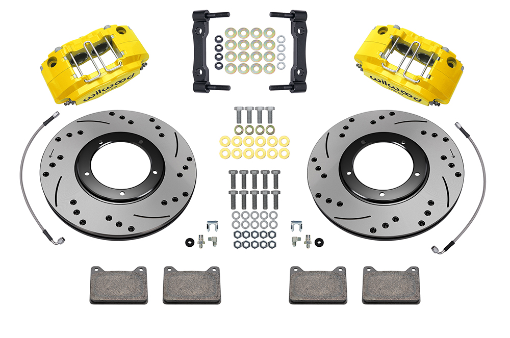 Wilwood Powerlite Front Brake Kit Parts Laid Out - Yellow Powder Coat Caliper - SRP Drilled & Slotted Rotor